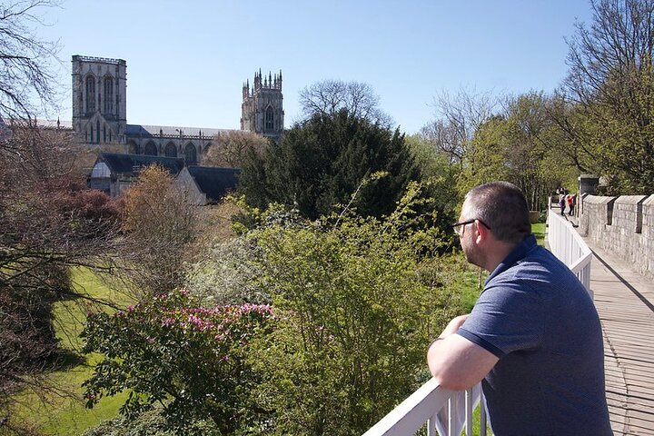 Dr Simon Rogerson admiring York Minster from the York city walls.